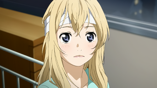 Kaori looking up at Kousei with tears in her eyes