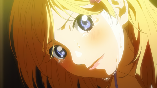 Image of Kaori thanking Kousei with tears in her eyes