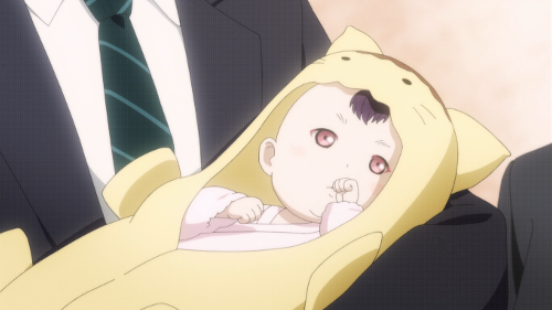 Image of a newborn Yukika in Shindo's arms